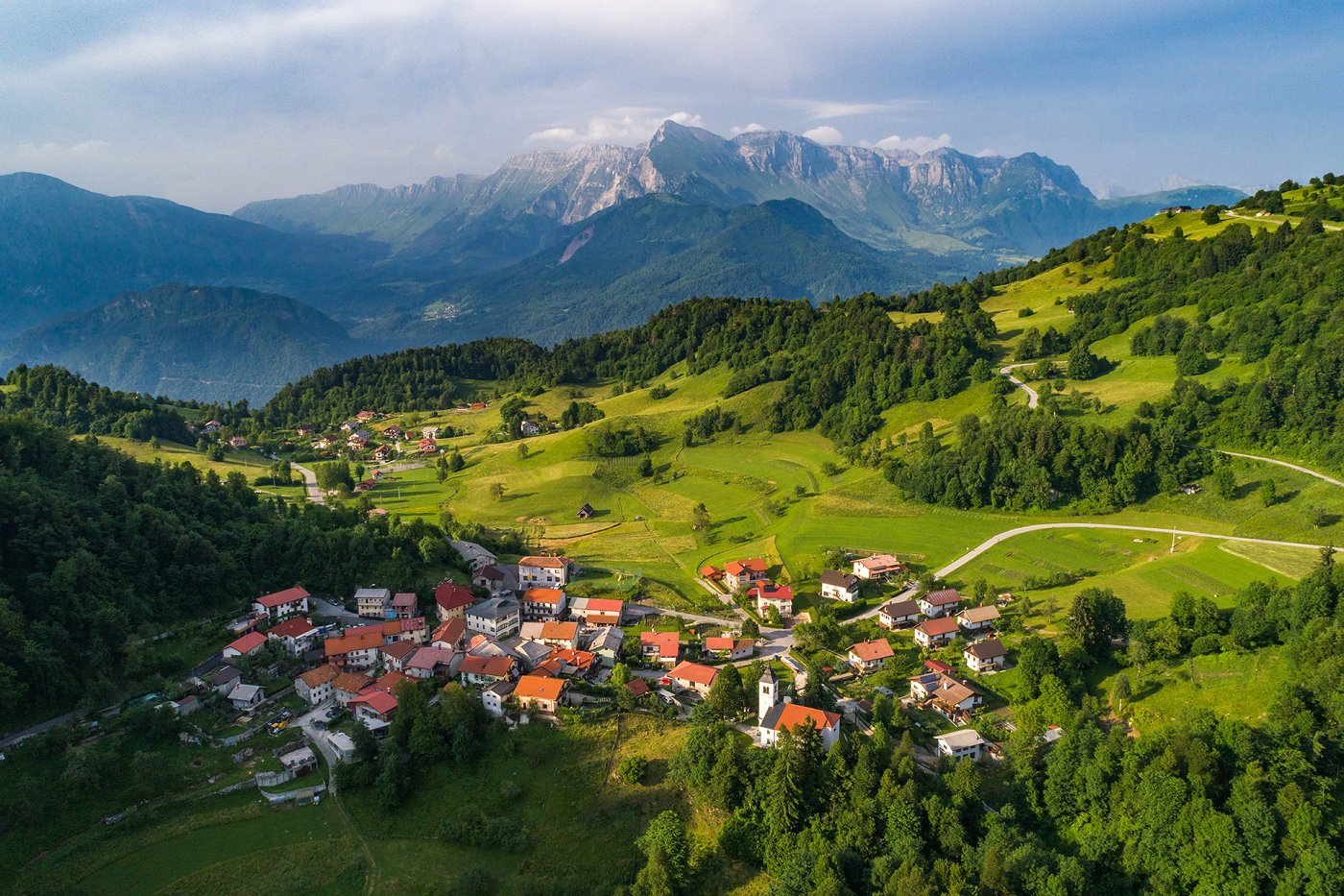 The Livška štorija hike follows scenic trails around Livek, combining beautiful views with local stories, tales, and friendly encounters between locals and visitors.